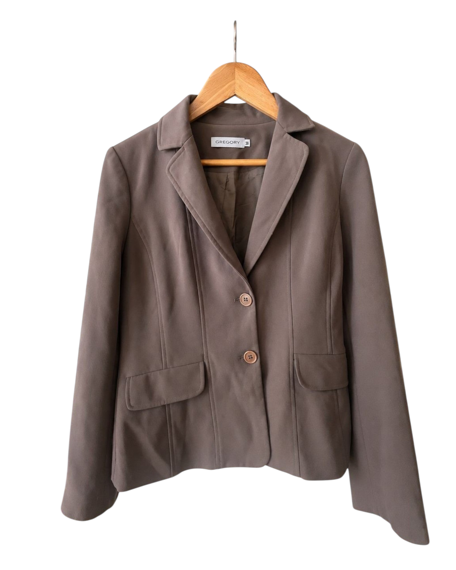 Blazer vintage marrom da BAZAR OFICIAL EFATA com corte clássico, dois botões frontais e bolsos laterais em cabide.